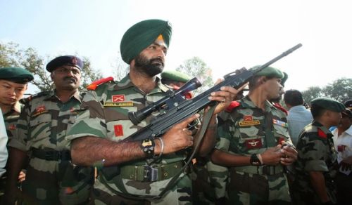 Celebrating “Rakhi Bandhan” Festival with the Indian BSF whose Hand is stained with Muslim Blood