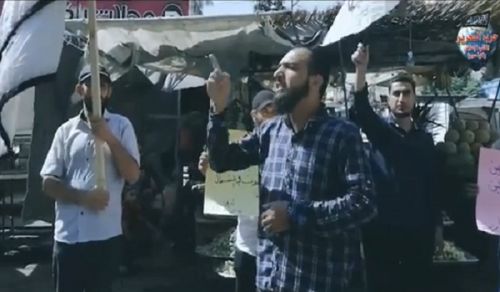 Hizb ut Tahrir / Wilayah Syria Stand in Areeha: Daraa seeks victory from the sincere and reveals the mask of the defeatists!