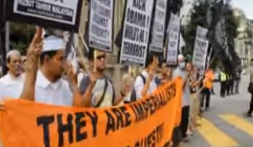 Malaysia: Hizb ut Tahrir organizes a Protest against Visit of Obama