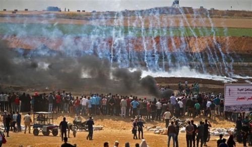 America Celebrates Embassy Opening in Occupied Al-Quds by Spattering Muslim Blood! The Only Solution to Remove the Occupation of Al-Quds is for the Courageous Army of the Second Righteous Khilafah (Caliphate) to Wage Jihad against the Jewish Entity